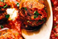 Gooey Cheese Stuffed Meatballs with Rich Homemade Tomato Sauce
