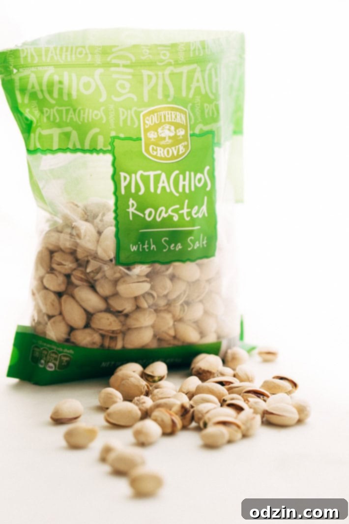 Ricotta Toasts with Pistachios and Honey - A quick and easy appetizer. The bread is warm, the ricotta is creamy, with a kiss of chopped pistachios and a drizzle of honey! #appetizers #toasts #ricottatoasts | Littlespicejar.com