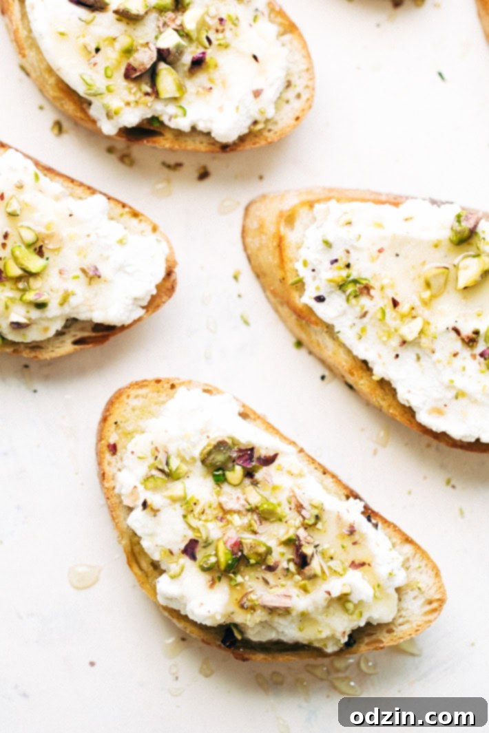 Ricotta Toasts with Pistachios and Honey - A quick and easy appetizer. The bread is warm, the ricotta is creamy, with a kiss of chopped pistachios and a drizzle of honey! #appetizers #toasts #ricottatoasts | Littlespicejar.com
