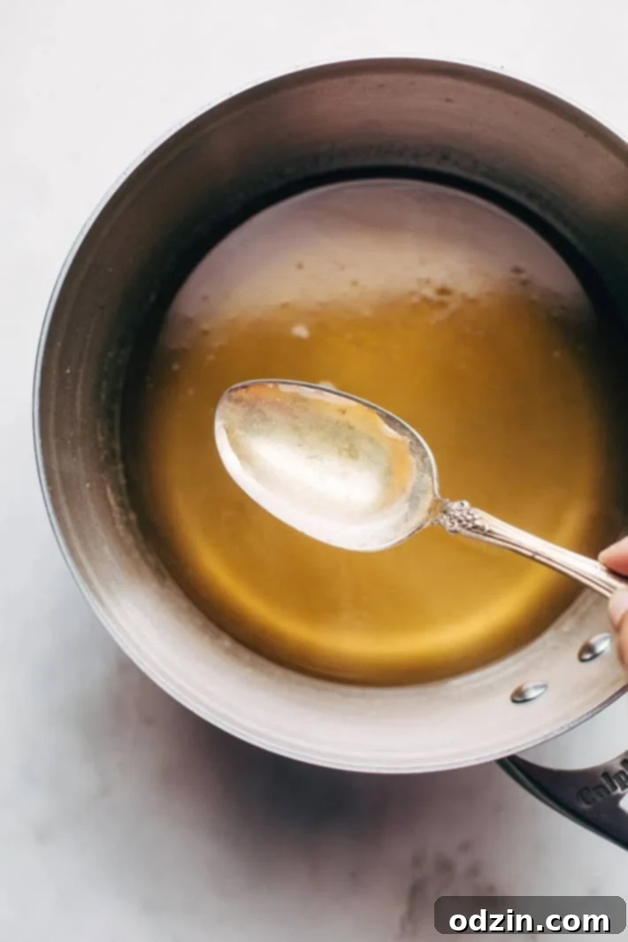Holiday Walnut Baklava - buttery phyllo with layers of ground walnuts in between and drizzled with a homemade simple syrup with sweet orange blossom and rose water! So good! #baklava #walnutbaklava #lebanesebaklava | Littlespicejar.com