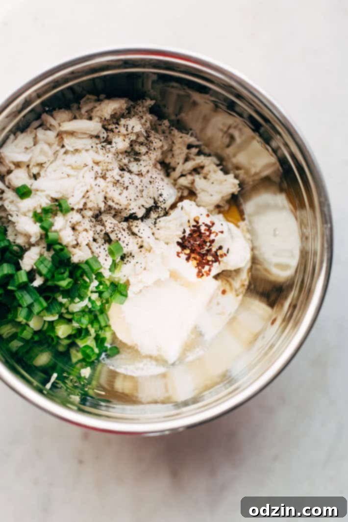 Close-up of bubbling hot crab rangoon dip with melted cheese