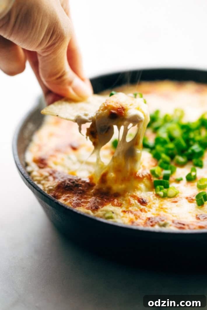 Bubbly hot crab rangoon dip with crispy wonton dippers