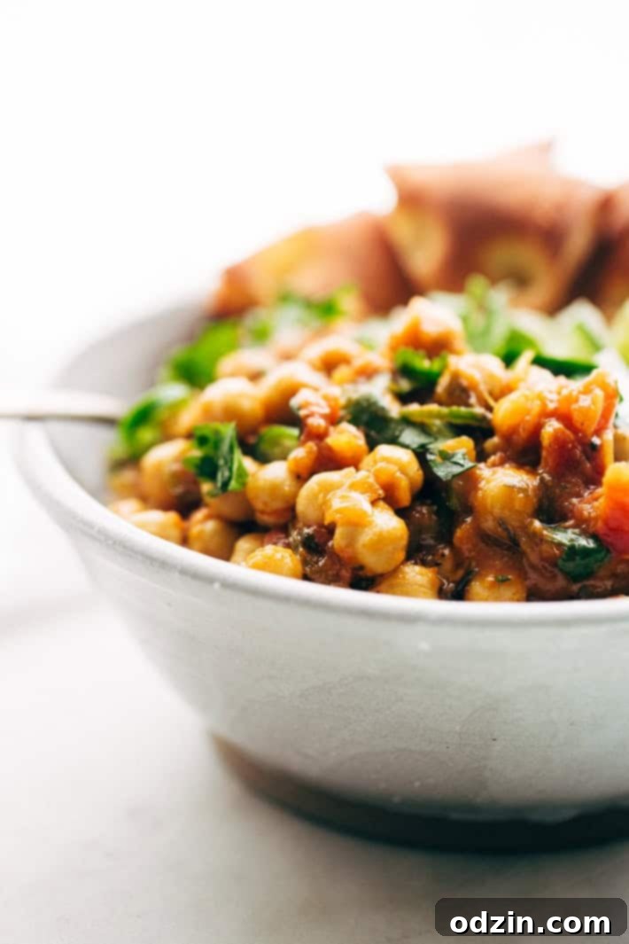 Weeknight Chana Masala Rice Bowls - A quick weeknight take on the traditional Chana Masala! Serve over basmati rice and it's the perfect warm and cozy winter meal! #chanamasala #indianfood #chana #vegan | Littlespicejar.com Weeknight Chana Masala Rice Bowls - A quick weeknight take on the traditional Chana Masala! Serve over basmati rice and it's the perfect warm and cozy winter meal! #chanamasala #indianfood #chana #vegan | Littlespicejar.com