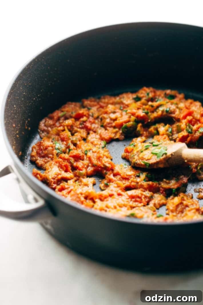 Weeknight Chana Masala Rice Bowls - A quick weeknight take on the traditional Chana Masala! Serve over basmati rice and it's the perfect warm and cozy winter meal! #chanamasala #indianfood #chana #vegan | Littlespicejar.com Weeknight Chana Masala Rice Bowls - A quick weeknight take on the traditional Chana Masala! Serve over basmati rice and it's the perfect warm and cozy winter meal! #chanamasala #indianfood #chana #vegan | Littlespicejar.com