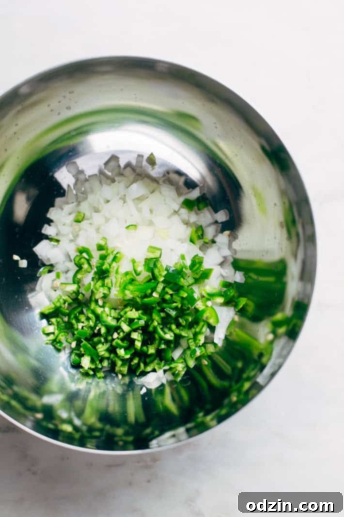 Easy Breakfast Migas - These Tex-Mex style scrambled eggs are made with tortilla chips, cheese, and lots of salsa! #migas #texmex #breakfast #brinner | Litltlespicejar.com Easy Breakfast Migas - These Tex-Mex style scrambled eggs are made with tortilla chips, cheese, and lots of salsa! #migas #texmex #breakfast #brinner | Litltlespicejar.com