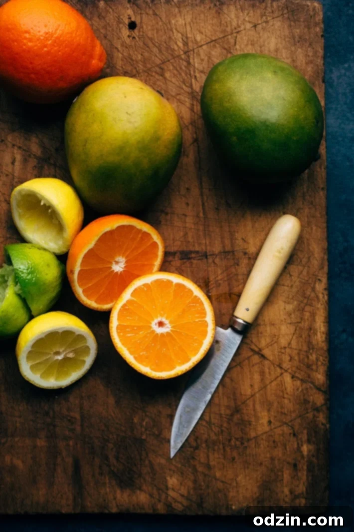 Tropical Mojo Chicken Quinoa Bowls with Mango Salsa and Black Beans 5 Preparing the Mojo chicken marinade ingredients: citrus, garlic, and spices