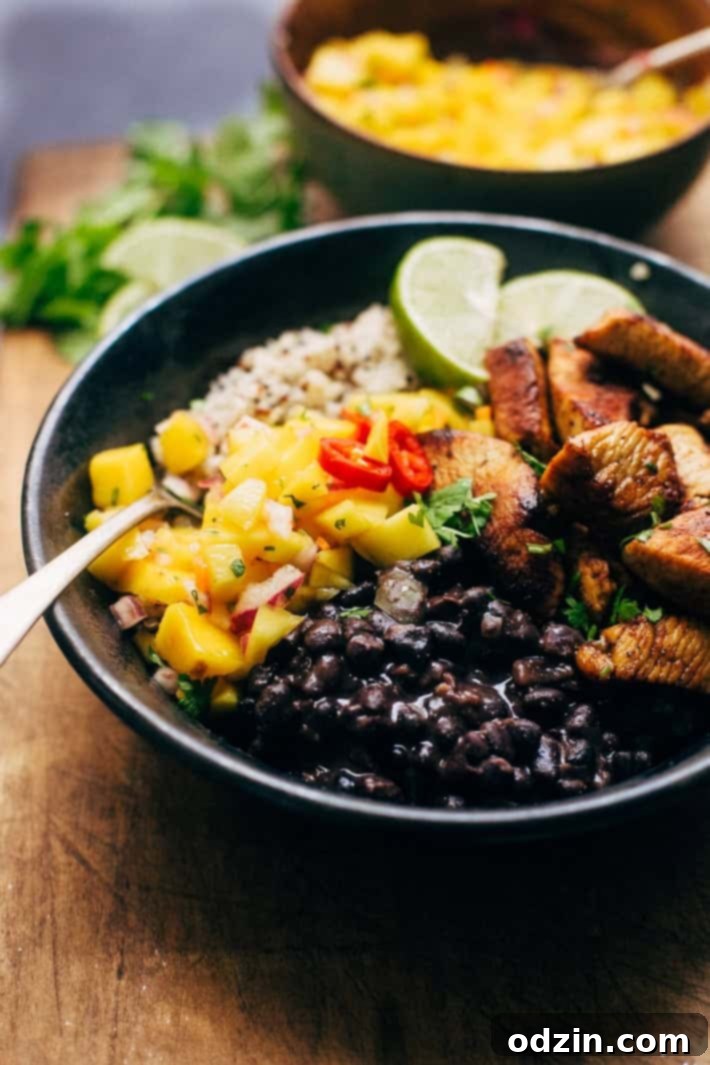 Tropical Mojo Chicken Quinoa Bowls with Mango Salsa and Black Beans 8 A complete Cuban Mojo Chicken Quinoa Bowl ready to be enjoyed