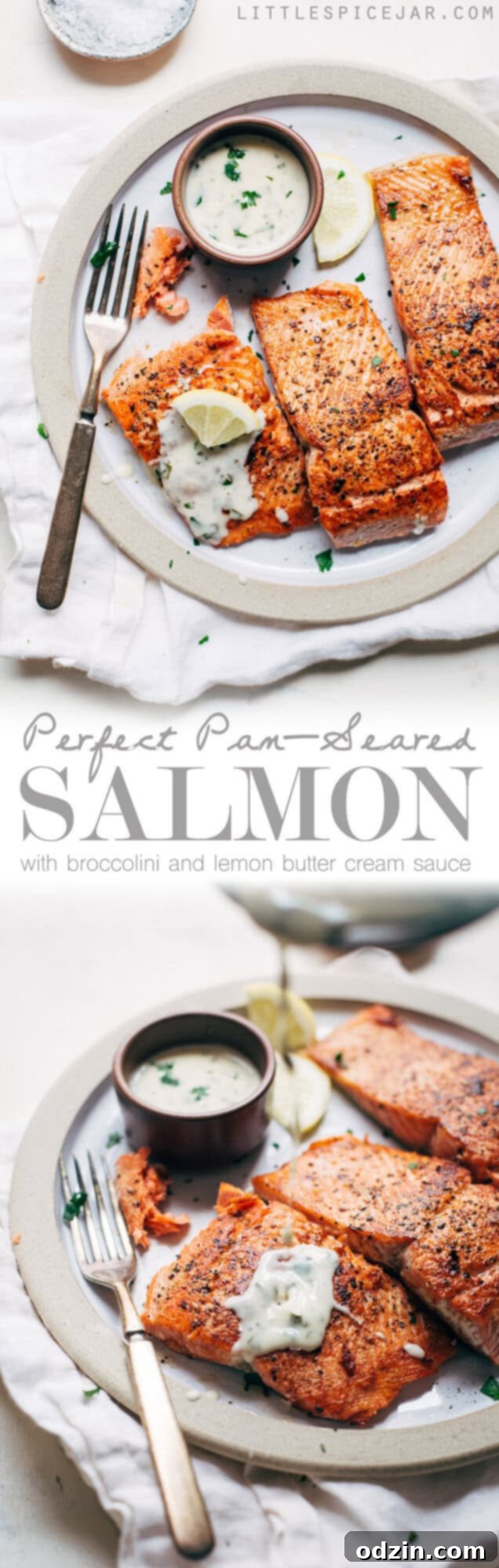 Overhead view of the complete pan-seared salmon dinner with roasted broccolini and lemon butter sauce.