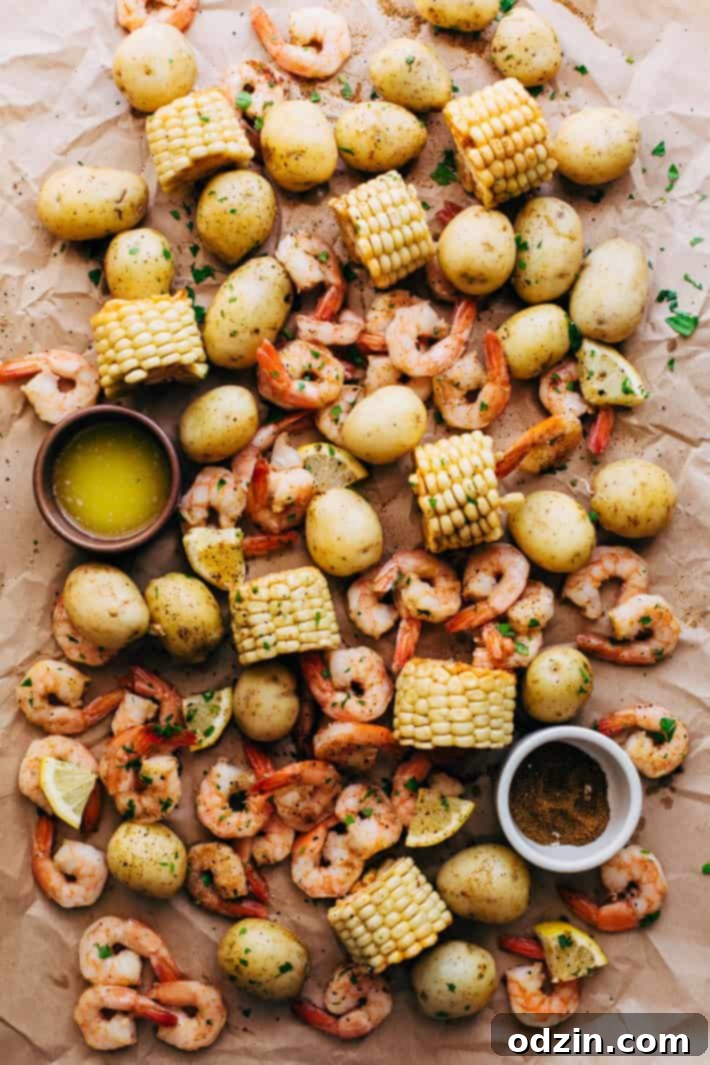 Garlic Loaded Southern Shrimp Boil - This is a 30 minute recipe for a homemade shrimp boil with homemade boil seasoning! #shrimpboil #homemadeoldbayseasoning #shrimp #boil #seafoodboil #crawfishboil | LIttlespicejar.com