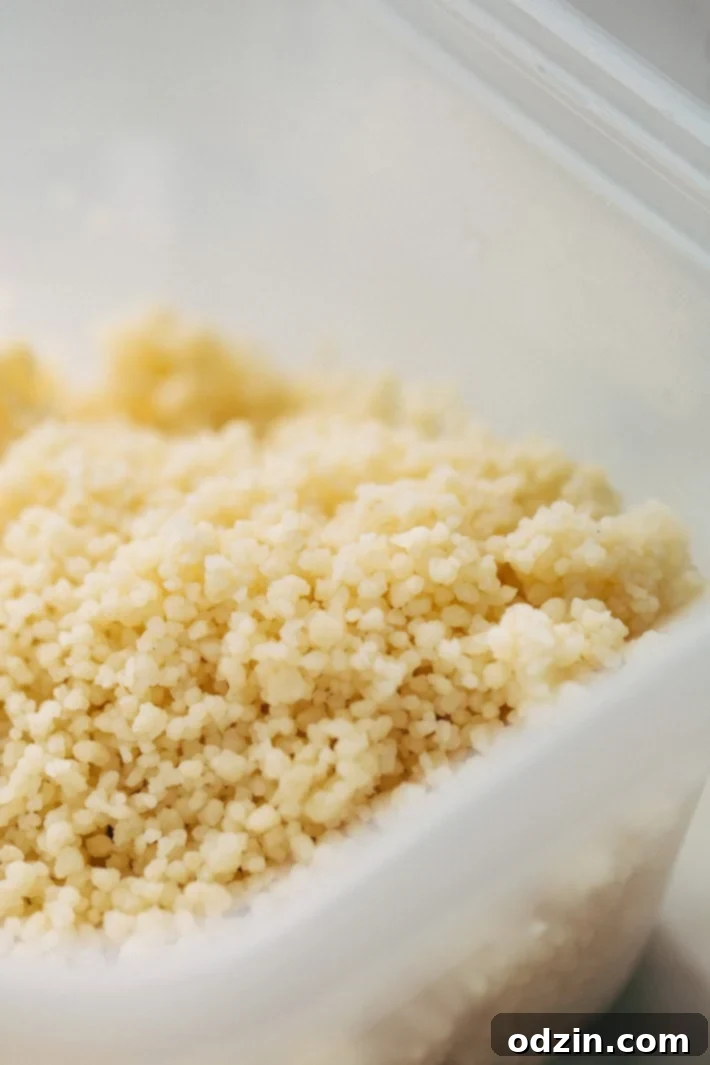 Serving bowl of Spring Mediterranean Couscous Salad ready to enjoy