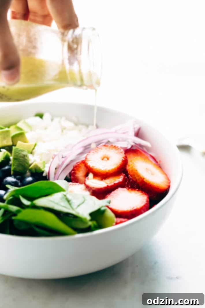 Avocado Strawberry Spinach Salad - topped with a citrusy poppyseed dressing. This salad is perfect for summer barbecues and picnics! #strawberryspinachsalad #spinachsalad #salad #strawberrypoppyseedsalad | Littlespicejar.com Avocado Strawberry Spinach Salad - topped with a citrusy poppyseed dressing. This salad is perfect for summer barbecues and picnics! #strawberryspinachsalad #spinachsalad #salad #strawberrypoppyseedsalad | Littlespicejar.com