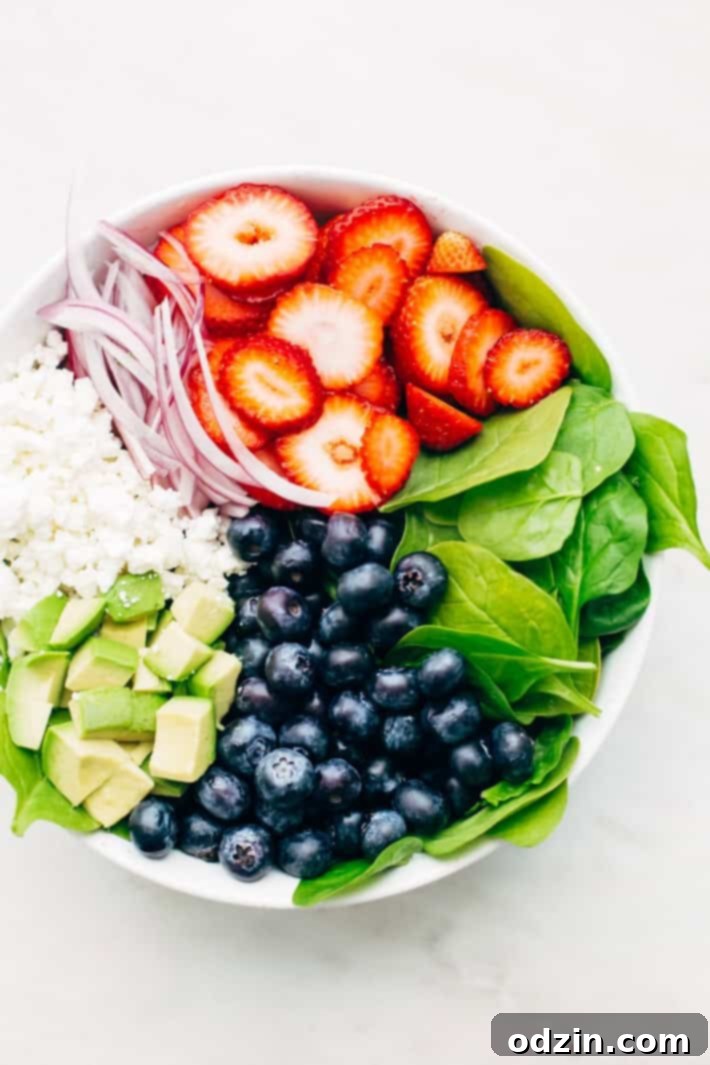 Avocado Strawberry Spinach Salad - topped with a citrusy poppyseed dressing. This salad is perfect for summer barbecues and picnics! #strawberryspinachsalad #spinachsalad #salad #strawberrypoppyseedsalad | Littlespicejar.com Avocado Strawberry Spinach Salad - topped with a citrusy poppyseed dressing. This salad is perfect for summer barbecues and picnics! #strawberryspinachsalad #spinachsalad #salad #strawberrypoppyseedsalad | Littlespicejar.com