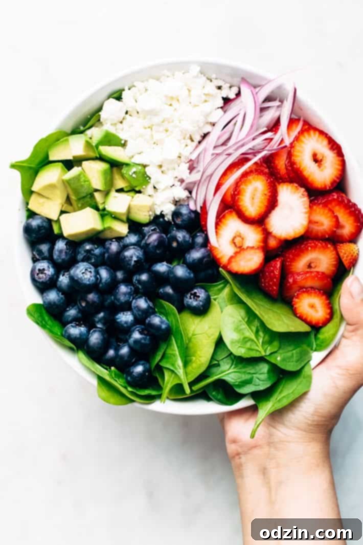 Avocado Strawberry Spinach Salad - topped with a citrusy poppyseed dressing. This salad is perfect for summer barbecues and picnics! #strawberryspinachsalad #spinachsalad #salad #strawberrypoppyseedsalad | Littlespicejar.com Avocado Strawberry Spinach Salad - topped with a citrusy poppyseed dressing. This salad is perfect for summer barbecues and picnics! #strawberryspinachsalad #spinachsalad #salad #strawberrypoppyseedsalad | Littlespicejar.com