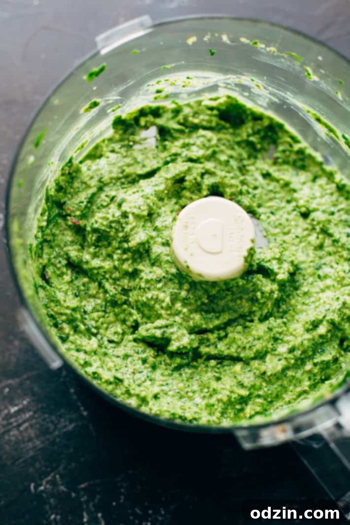 Close-up of Fresh Spinach Pesto Tortellini Salad Ready to Serve