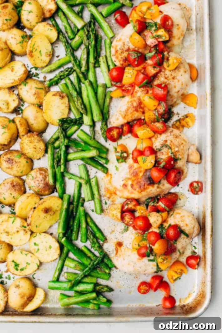 v Sheet Pan Bruschetta Chicken with Potatoes and Asparagus - make a healthy, nutritious dinner all on one sheet pan! #bruschettachicken #roastedchicken #chickenbreast #bruschetta | Littlespicejar.com