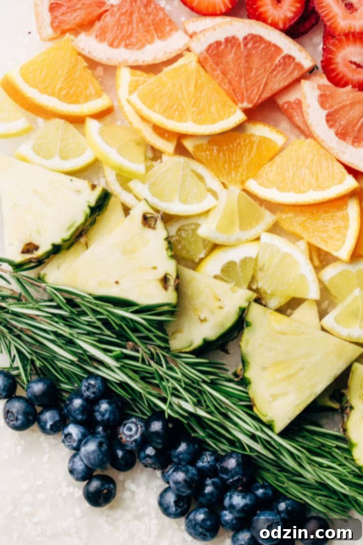 Blueberry Lemon Mint Infused Water served in a pitcher and glass