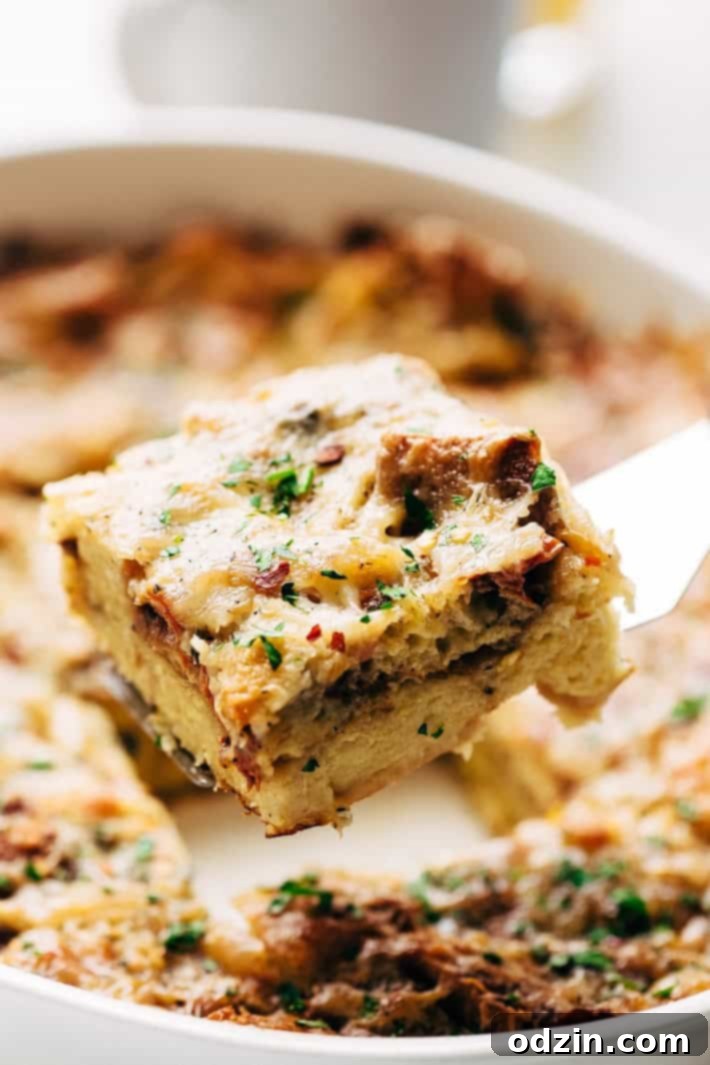 Overhead shot of the Sun-dried Tomato Basil Breakfast Casserole, steaming hot and ready.