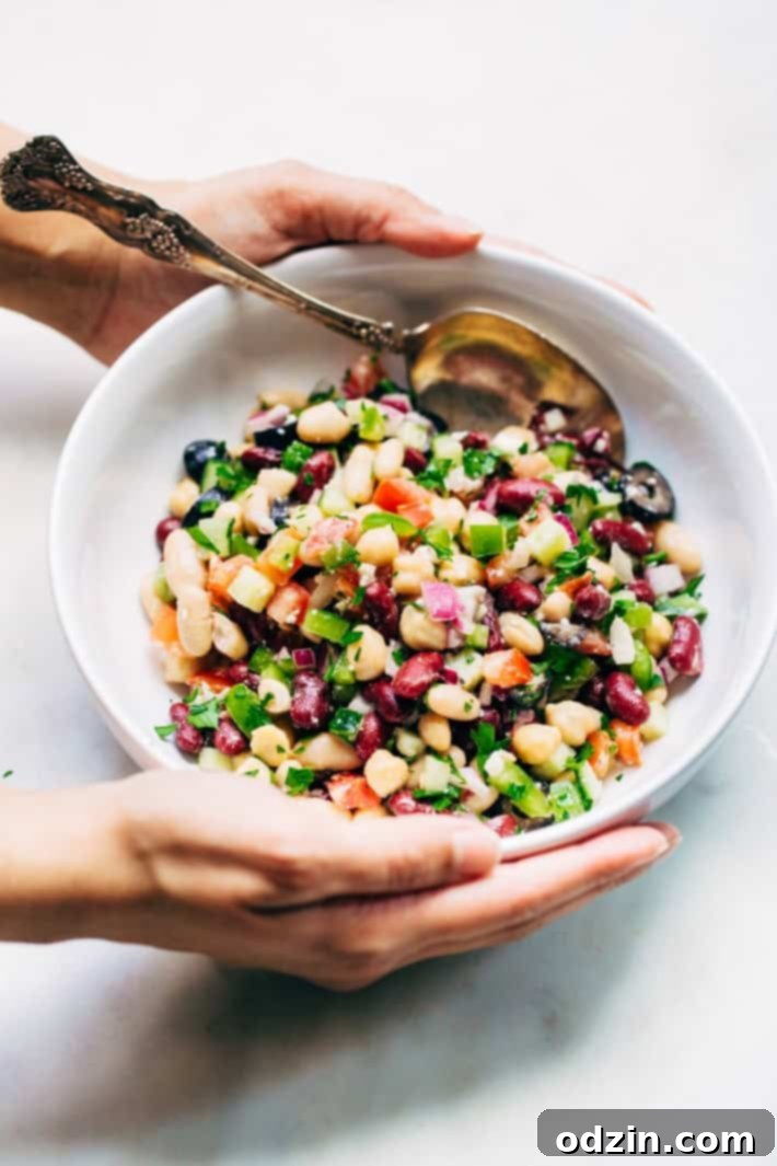 Colorful and fresh Three Bean Greek Salad in a large bowl