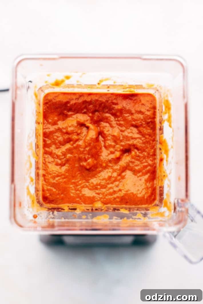 Homemade Tomato Sauce Ingredients Close-up of roasted tomatoes and garlic before blending