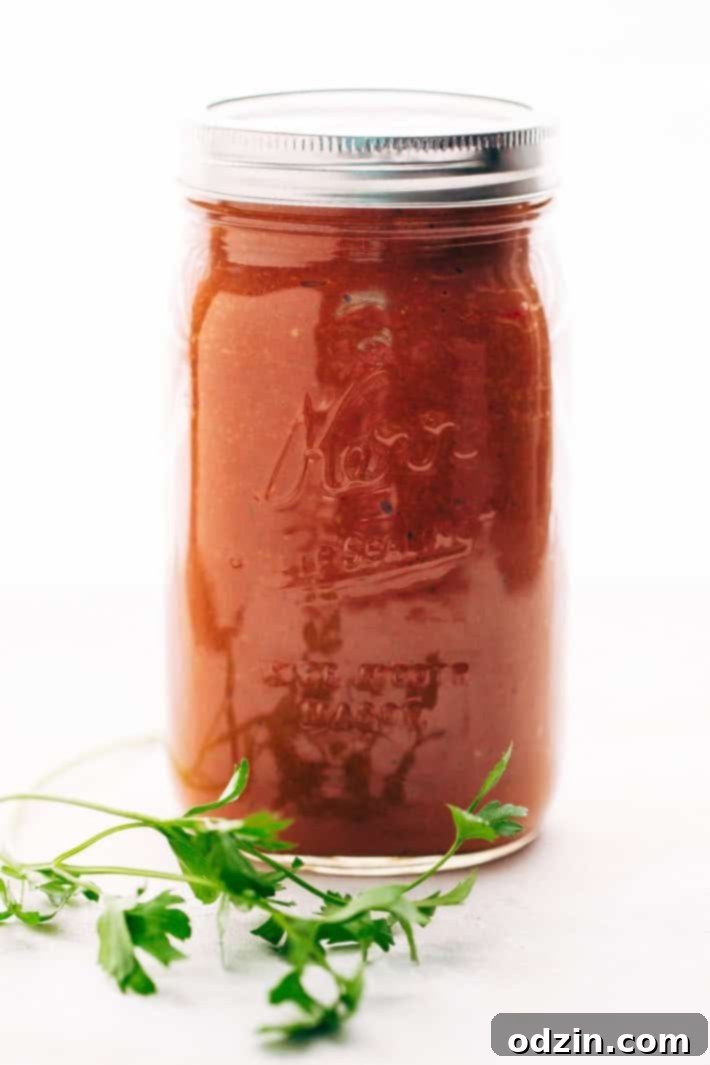 Versatile Homemade Tomato Sauce Serving homemade roasted tomato sauce on pasta