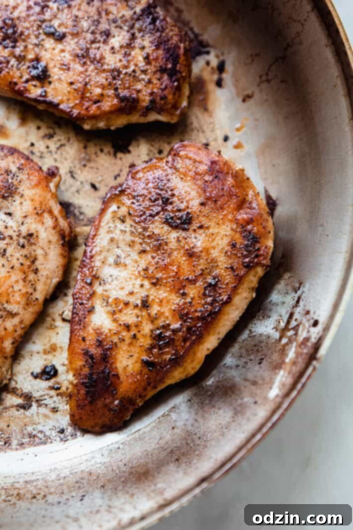 seared chicken breast in skillet