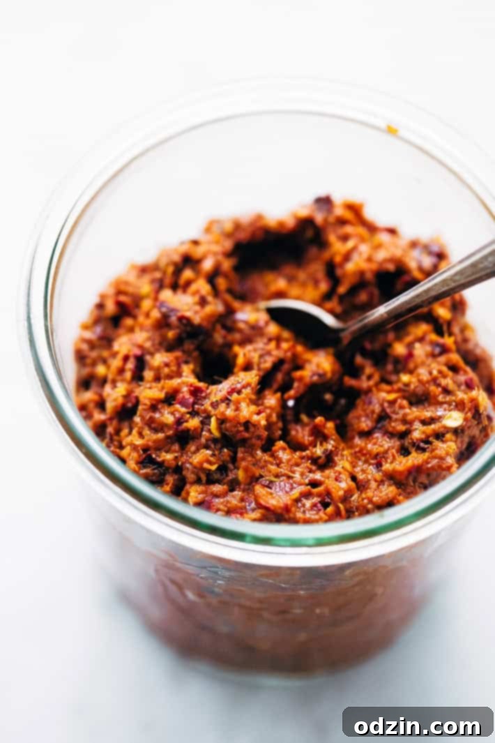 Homemade Thai Massaman Curry Paste - A quick 15 minute paste that's perfect to use in all kinds of curries! This can also be made vegan/vegetarian friendly. #massamancurry #homemadecurrypaste #thaicurry #massamancurrypaste | Littlespicejar.com A bowl of delicious homemade Thai Massaman curry, showcasing the rich texture and vibrant color, ready to be served.