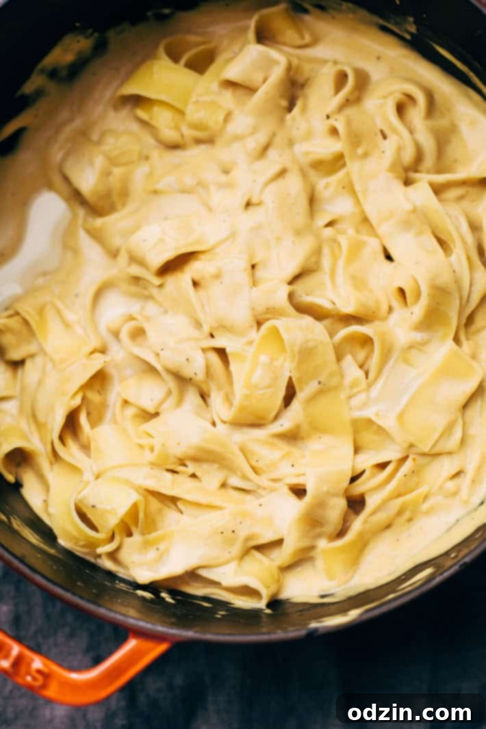 Sage Brown Butter Healthier Pumpkin Alfredo - a homemade pumpkin alfredo with a cashew cream sauce! So good as a side or as a main dish! #healthierpumpkinalfredo #pumpkin #pumpkinalfredo #cashewcreamsauce | Littlespicejar.com