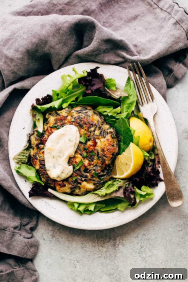 Golden Wild Rice Chicken Fritters with Creamy Garlic Herb Dip 7 Ingredients for Cheesy Wild Rice Chicken Fritters in a mixing bowl