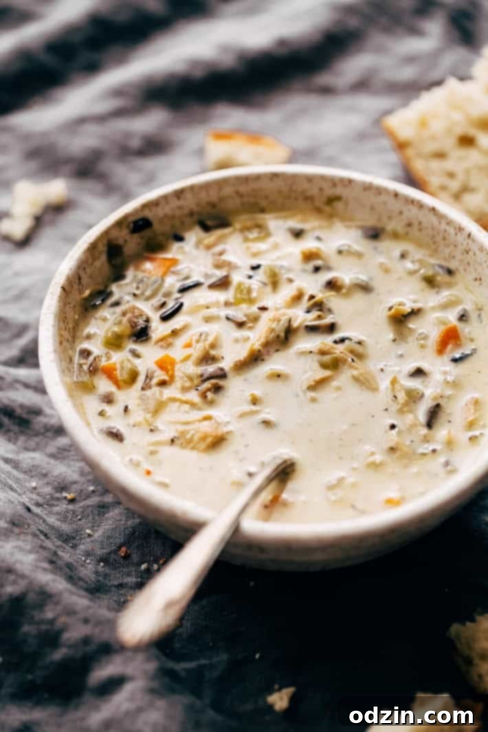 Instant Pot Chicken Wild Rice Soup - this soup is warm and filling and takes 45 minutes to make from start to finish! #instantpot #pressurecooker #soup #chickenwildricesoup #wildricesoup | Littlespicejar.com Instant Pot Chicken Wild Rice Soup - this soup is warm and filling and takes 45 minutes to make from start to finish! #instantpot #pressurecooker #soup #chickenwildricesoup #wildricesoup | Littlespicejar.com