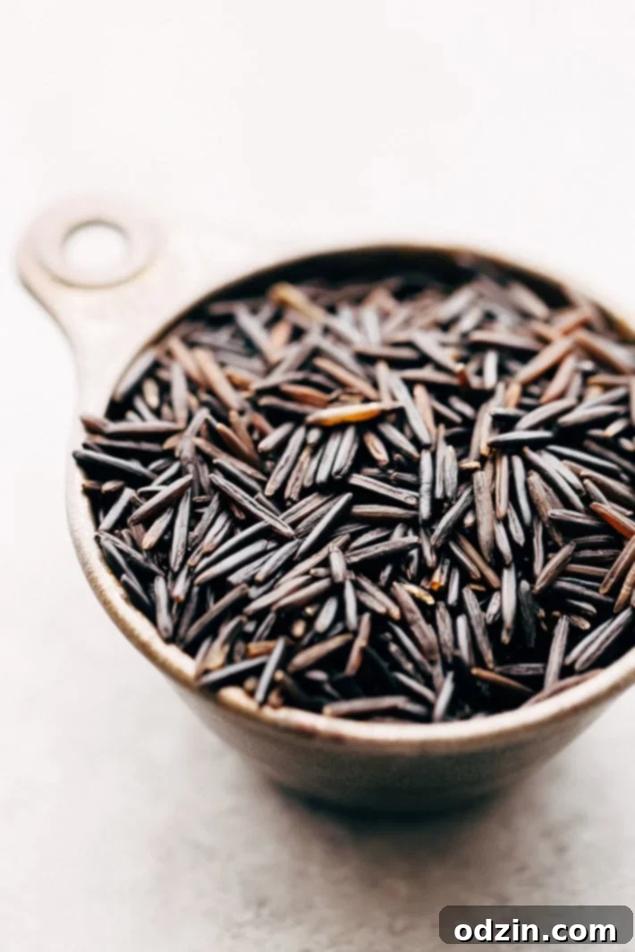 Instant Pot Chicken Wild Rice Soup - this soup is warm and filling and takes 45 minutes to make from start to finish! #instantpot #pressurecooker #soup #chickenwildricesoup #wildricesoup | Littlespicejar.com Instant Pot Chicken Wild Rice Soup - this soup is warm and filling and takes 45 minutes to make from start to finish! #instantpot #pressurecooker #soup #chickenwildricesoup #wildricesoup | Littlespicejar.com