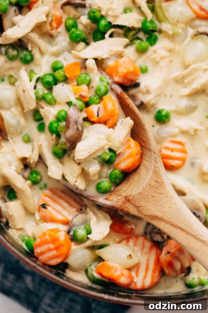 Chicken Pot Tater Tot Hotdish Ingredients - Prepped vegetables including mushrooms and celery, ready to be cooked for the creamy casserole base.