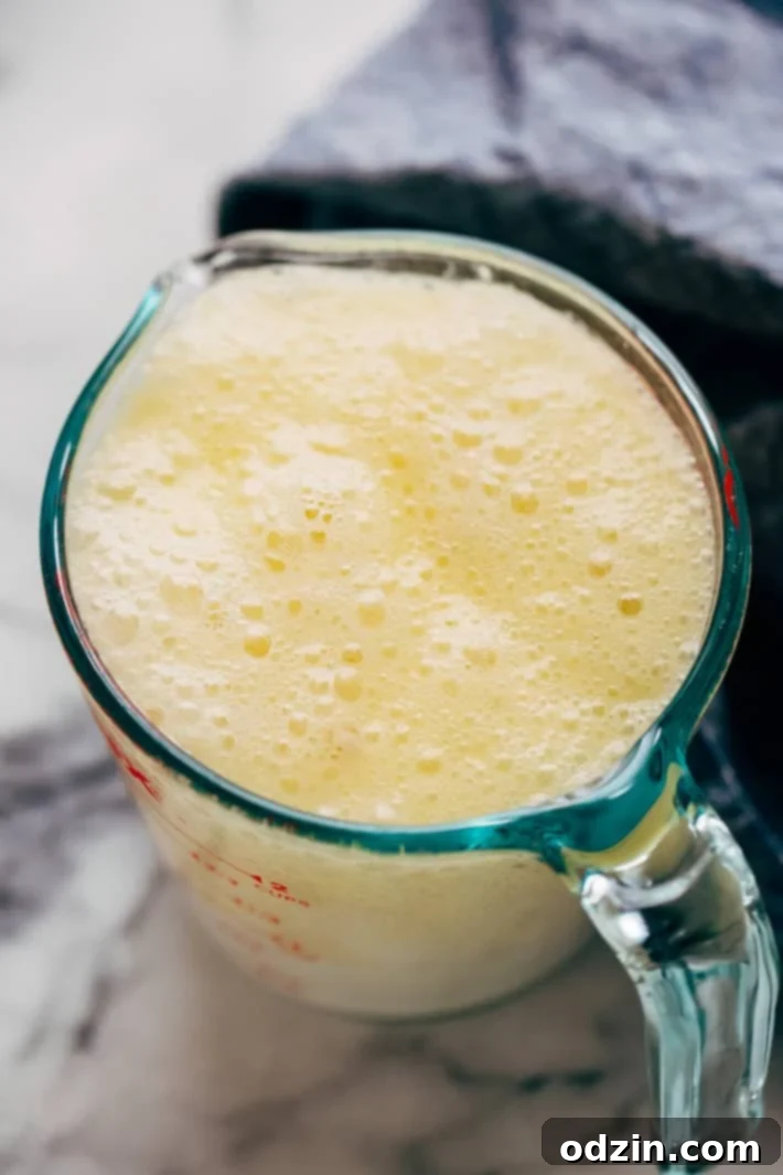 Homemade Cinnamon Swirl Bread - swirls of cinnamon sugar and raisins (or chocolate chips). Perfect to serve smeared with butter or to turn into french toast! #cinnamonbread #cinnamonswirlbread #swirlbread #cinnamonsugarbread | Littlespicejar.com