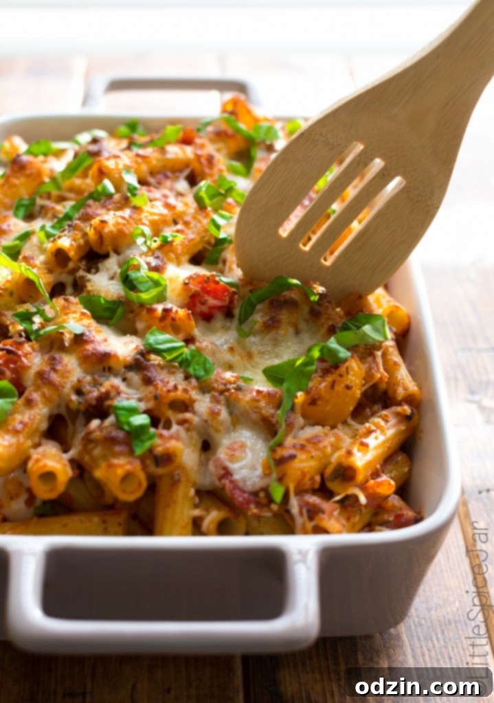 Fiery Caprese Pasta Bake 2 Spicy Baked Caprese Pasta with Rigatoni and melted cheese