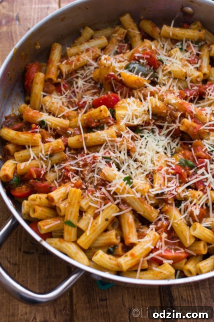 Fiery Caprese Pasta Bake 3 Close-up of baked Caprese pasta with fresh basil