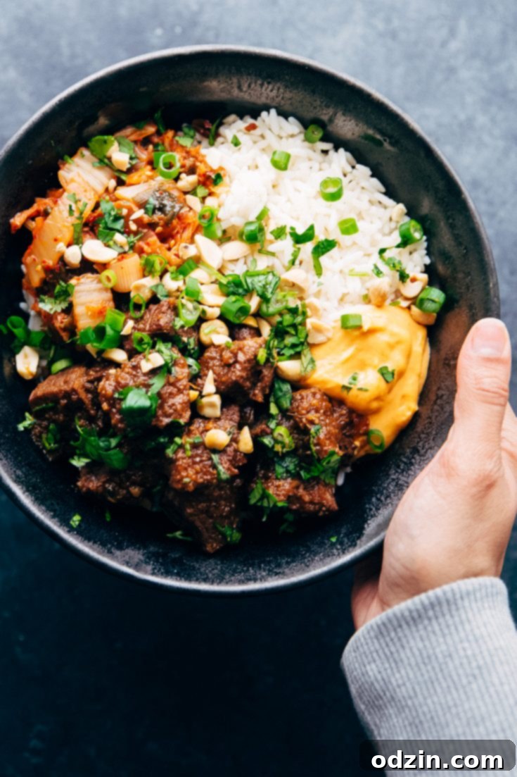 Instant Pot Korean Beef Bowls served with rice and fresh toppings.