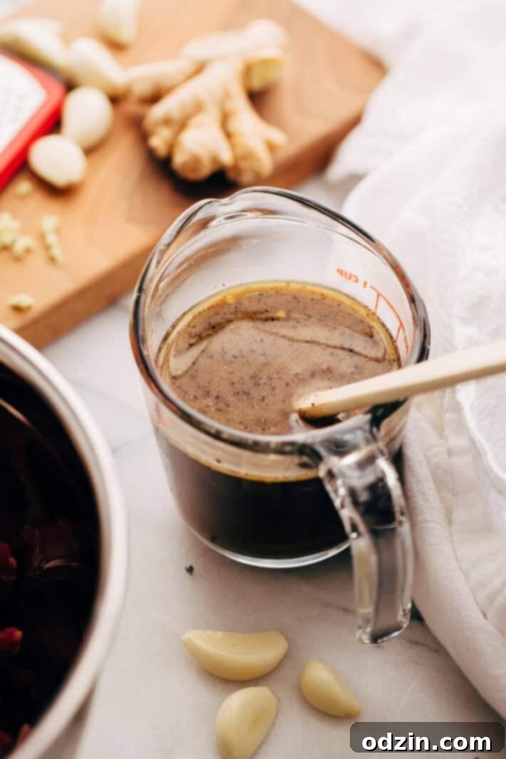 steak sauce in measuring cup