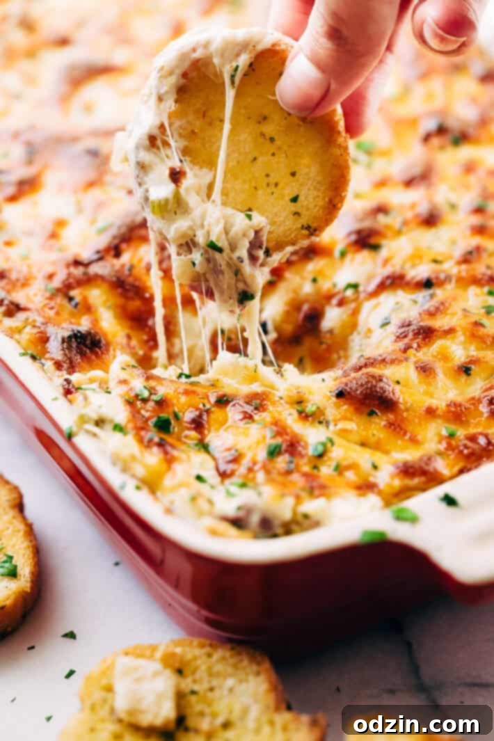 Delicious Philly Cheese Steak Dip Classic Philly Cheese Steak Dip, bubbling hot and ready to serve