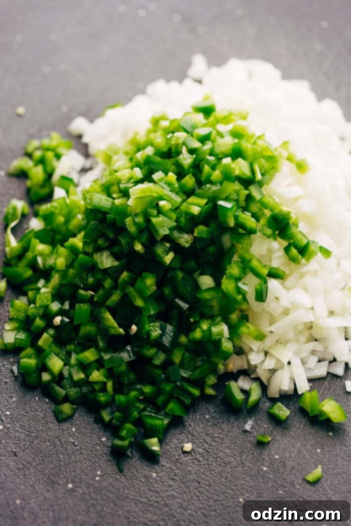 Ingredients for Philly Cheese Steak Dip Philly Cheese Steak Dip ingredients laid out for preparation