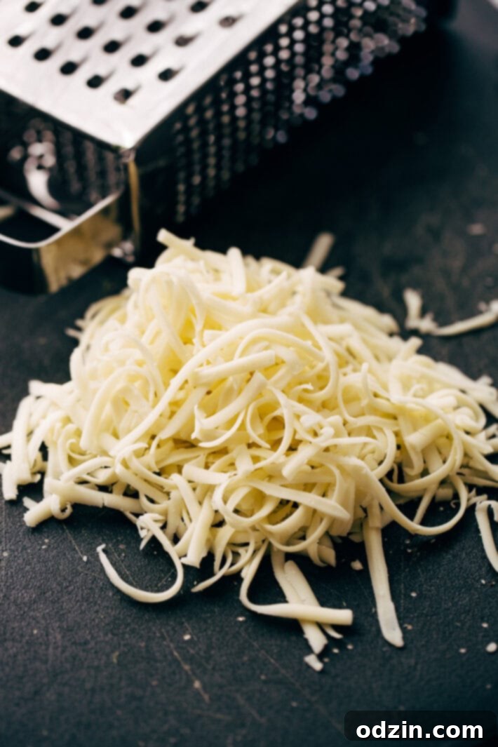 Chopping roast beef for the dip Roast beef being chopped for the Philly Cheese Steak Dip