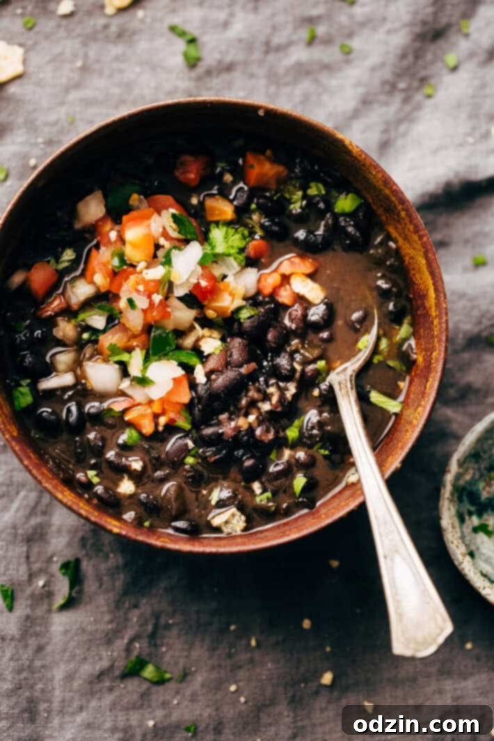 Instant Pot Quick Detox Black Bean Soup 2 Instant Pot Easy Detoxing Black Bean Soup - a super simple homemade soup made in the pressure cooker! Great for bagged lunches because it's better as it sits! #spicyblackbeansoup #blackbeansoup #detoxsoup #detoxingsoup | Littlespicejar.com