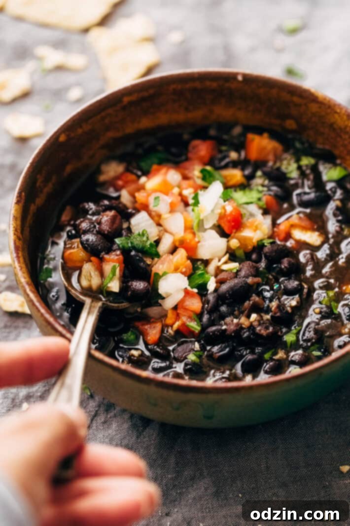 Instant Pot Easy Detoxing Black Bean Soup - a super simple homemade soup made in the pressure cooker! Great for bagged lunches because it's better as it sits! #spicyblackbeansoup #blackbeansoup #detoxsoup #detoxingsoup | Littlespicejar.comInstant Pot Easy Detoxing Black Bean Soup - a super simple homemade soup made in the pressure cooker! Great for bagged lunches because it's better as it sits! #spicyblackbeansoup #blackbeansoup #detoxsoup #detoxingsoup | Littlespicejar.com Instant Pot Easy Detoxing Black Bean Soup - a super simple homemade soup made in the pressure cooker! Great for bagged lunches because it's better as it sits! #spicyblackbeansoup #blackbeansoup #detoxsoup #detoxingsoup | Littlespicejar.com