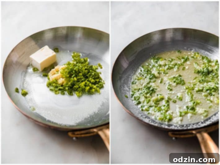 Minced garlic and sliced scallions gently sautéing in butter and oil in a large skillet