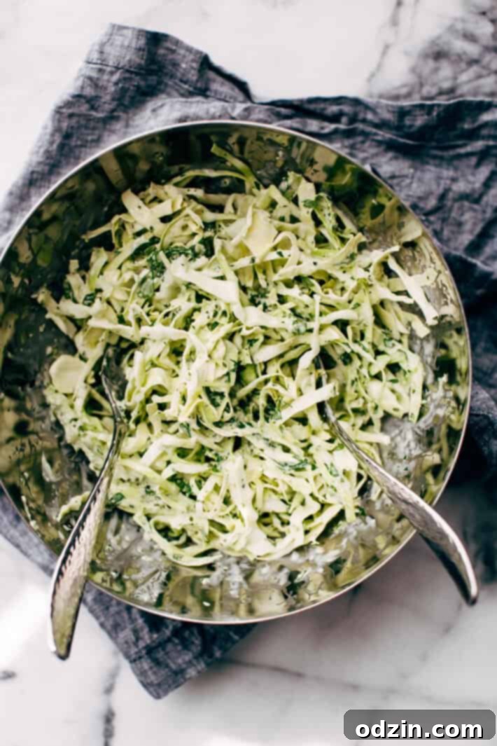 Simple Shrimp Burgers with Jalapeño Lime Slaw - these burgers take in the ballpark of 30 minutes to make. You can serve them on a bed of jalapeño lime slaw or on a brioche bun! Simple, healthy, and delicious! #seafood #shrimp #shrimpburgers #dinner #slaw | Littlespicejar.com Simple Shrimp Burgers with Jalapeño Lime Slaw - these burgers take in the ballpark of 30 minutes to make. You can serve them on a bed of jalapeño lime slaw or on a brioche bun! Simple, healthy, and delicious! #seafood #shrimp #shrimpburgers #dinner #slaw | Littlespicejar.com