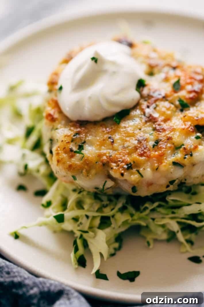 Simple Shrimp Burgers with Jalapeño Lime Slaw - these burgers take in the ballpark of 30 minutes to make. You can serve them on a bed of jalapeño lime slaw or on a brioche bun! Simple, healthy, and delicious! #seafood #shrimp #shrimpburgers #dinner #slaw | Littlespicejar.com Simple Shrimp Burgers with Jalapeño Lime Slaw - these burgers take in the ballpark of 30 minutes to make. You can serve them on a bed of jalapeño lime slaw or on a brioche bun! Simple, healthy, and delicious! #seafood #shrimp #shrimpburgers #dinner #slaw | Littlespicejar.com