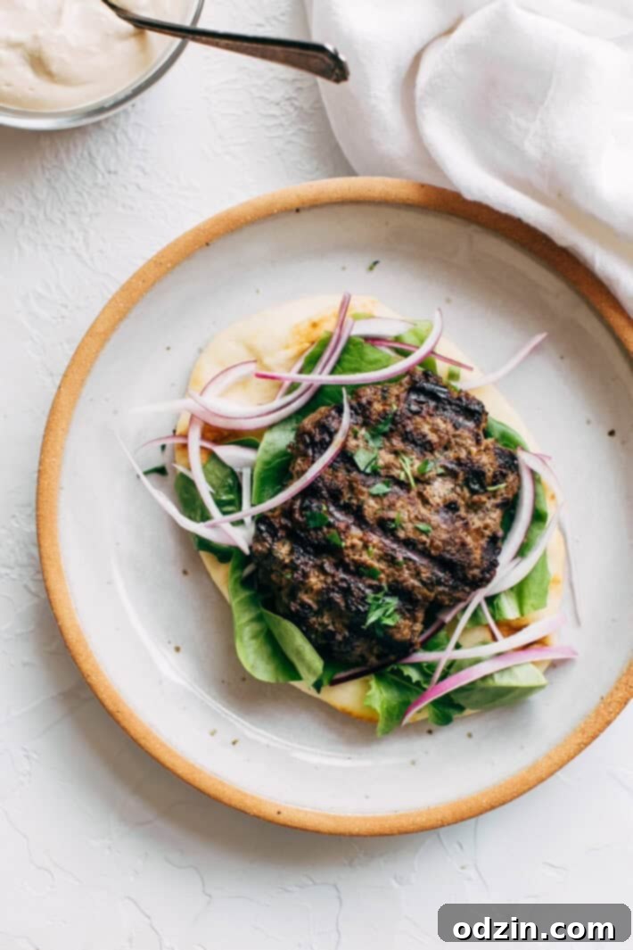 Kofta Pita Sandwiches - homemade kofta kabobs made with just a few ingredients and stuffed inside pocket pita bread! These are so good with my homemade garlic tahini sauce! #kofta #koftakabob #koftapitasandwich #naanwich | Littlespicejar.com