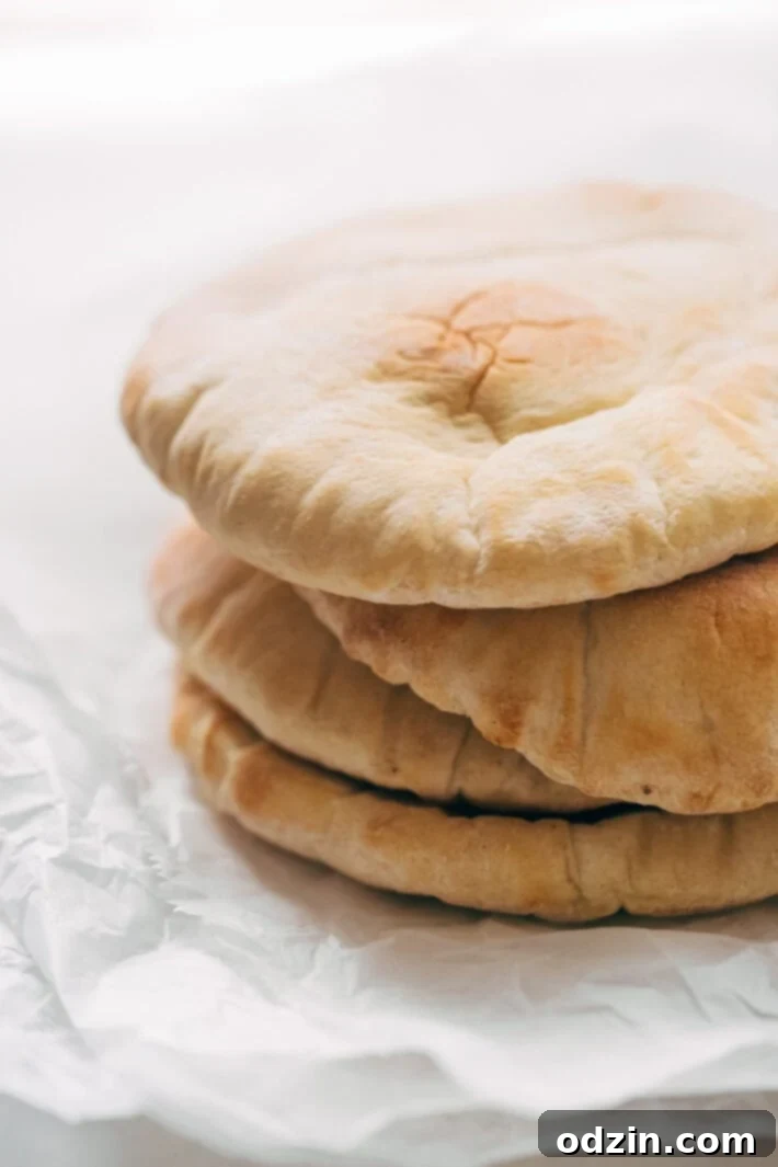 Kofta Pita Sandwiches - homemade kofta kabobs made with just a few ingredients and stuffed inside pocket pita bread! These are so good with my homemade garlic tahini sauce! #kofta #koftakabob #koftapitasandwich #naanwich | Littlespicejar.com