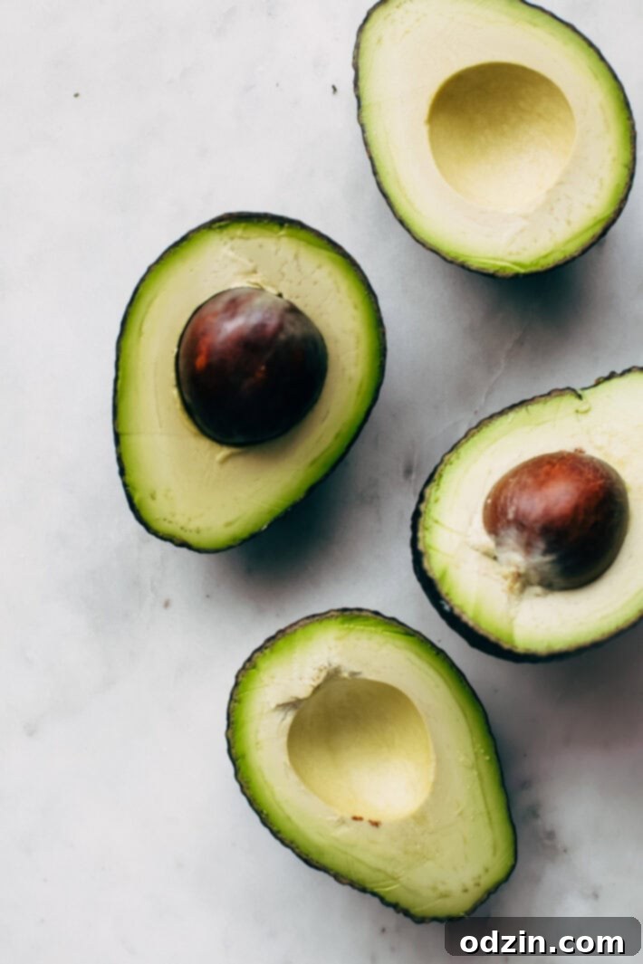 Creamy Guacamole Salsa - An easy avocado dip that tastes just like Mama Ninfa's Green Sauce. Serve with chips or dollop on tacos! #greensauce #mamaninfas #avocadodip #guacamolesalsa | Littlespicejar.com Creamy Guacamole Salsa - An easy avocado dip that tastes just like Mama Ninfa's Green Sauce. Serve with chips or dollop on tacos! #greensauce #mamaninfas #avocadodip #guacamolesalsa | Littlespicejar.com