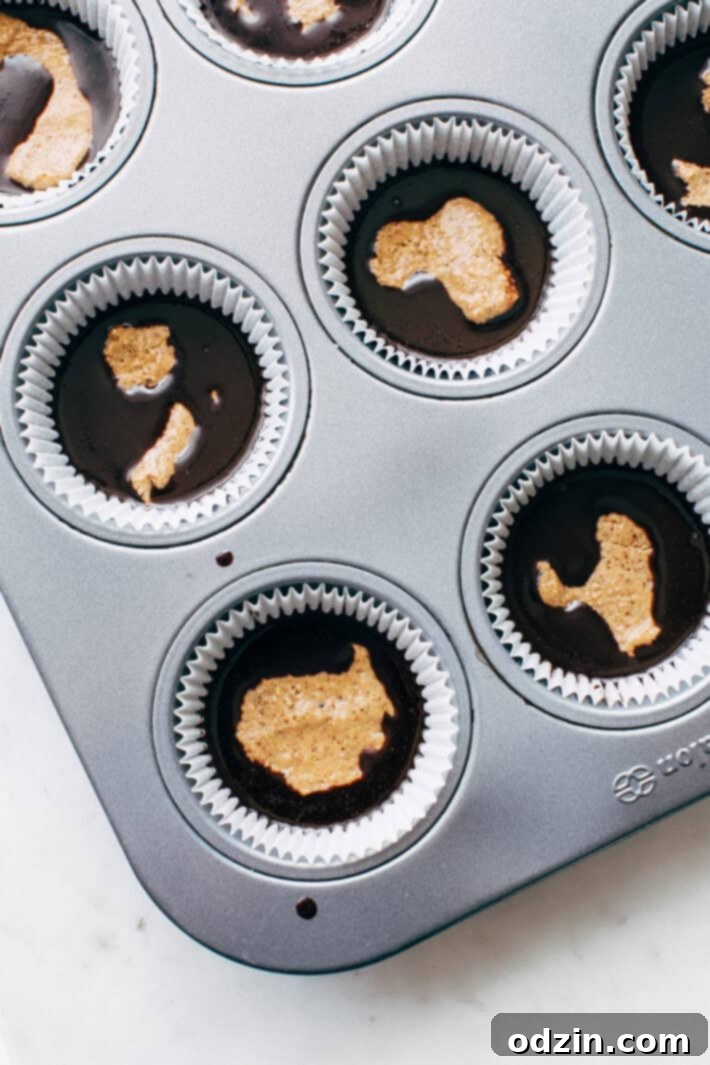 Close-up of a perfectly layered Mocha Almond Butter Cup