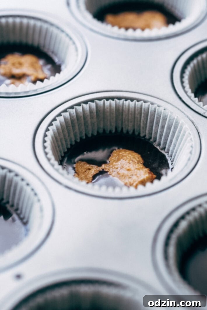 Mocha Almond Butter Cups chilling in a muffin tin
