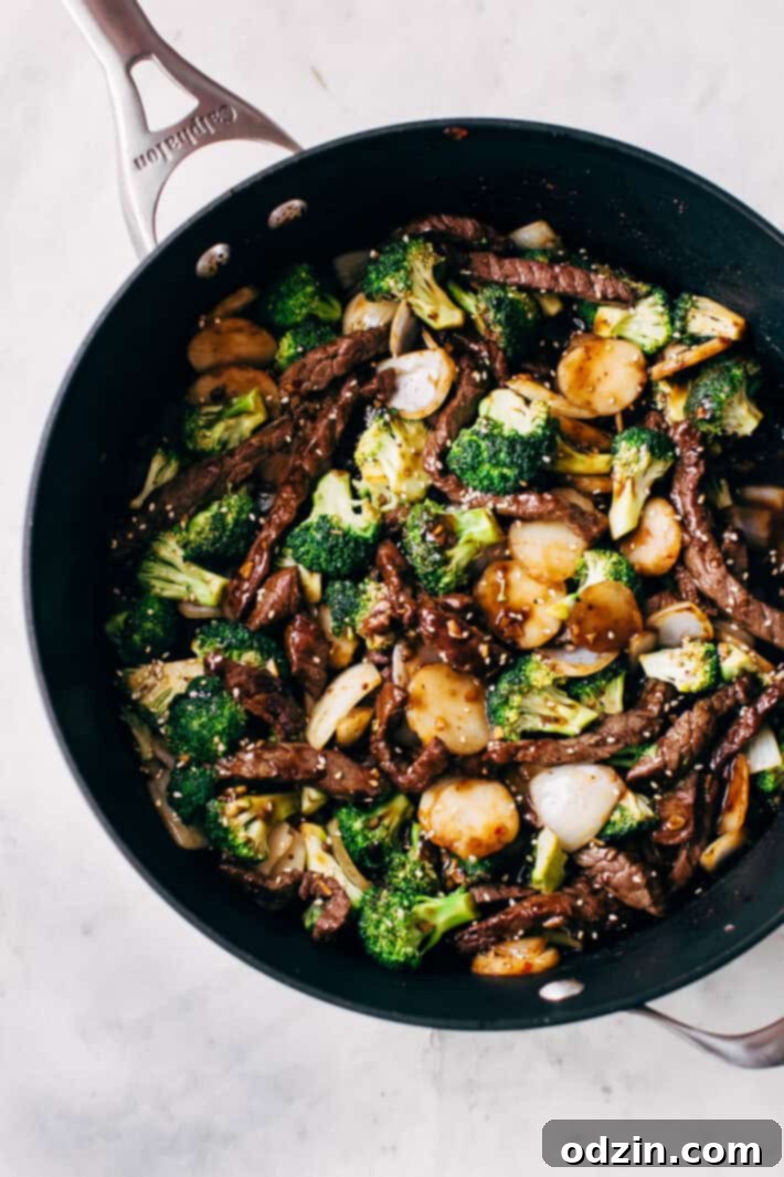 Best Easy Broccoli Beef Stir Fry Recipe - the easiest recipe that takes in the ballpark of 30 minutes to make and tastes better than takeout! #beefandbroccoli #broccolibeef #broccolibeefstirfry #stirfry #takeout | Littlespicejar.com
